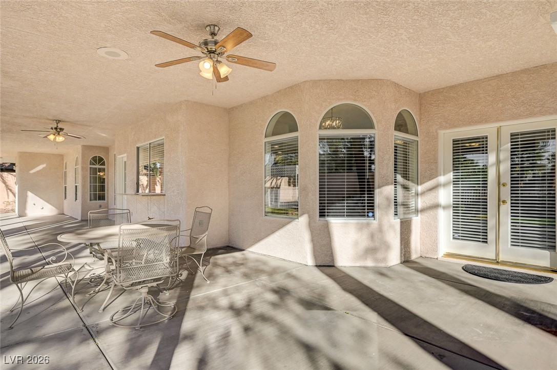 2955 El Camino Road Las Vegas, NV 89146 - Photo 75 of 99 View of patio / terrace featuring ceiling fan, french doors, and outdoor dining space