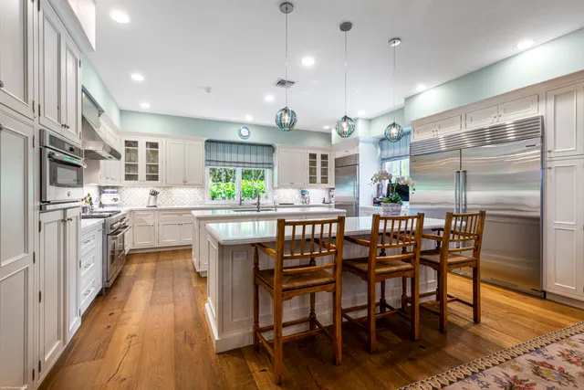 a outdoor dining space with furniture window and wooden floor