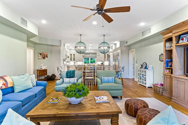 a view of a living room and a wooden floor