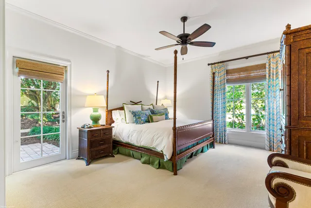 a bathroom with a toilet and a shower curtain