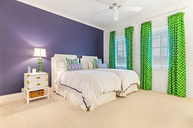 an aerial view of a house with a garden and a table