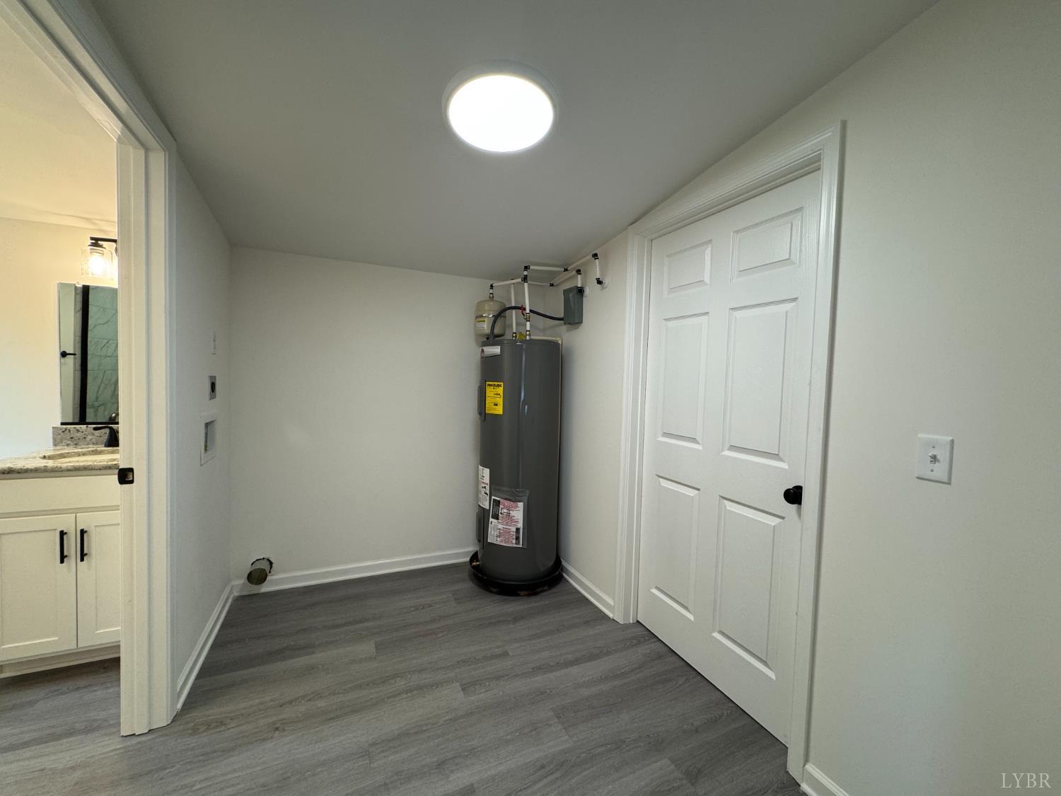 287 Harrell Street Appomattox, VA 24522 - Photo 11 of 17 wooden floor in an empty room