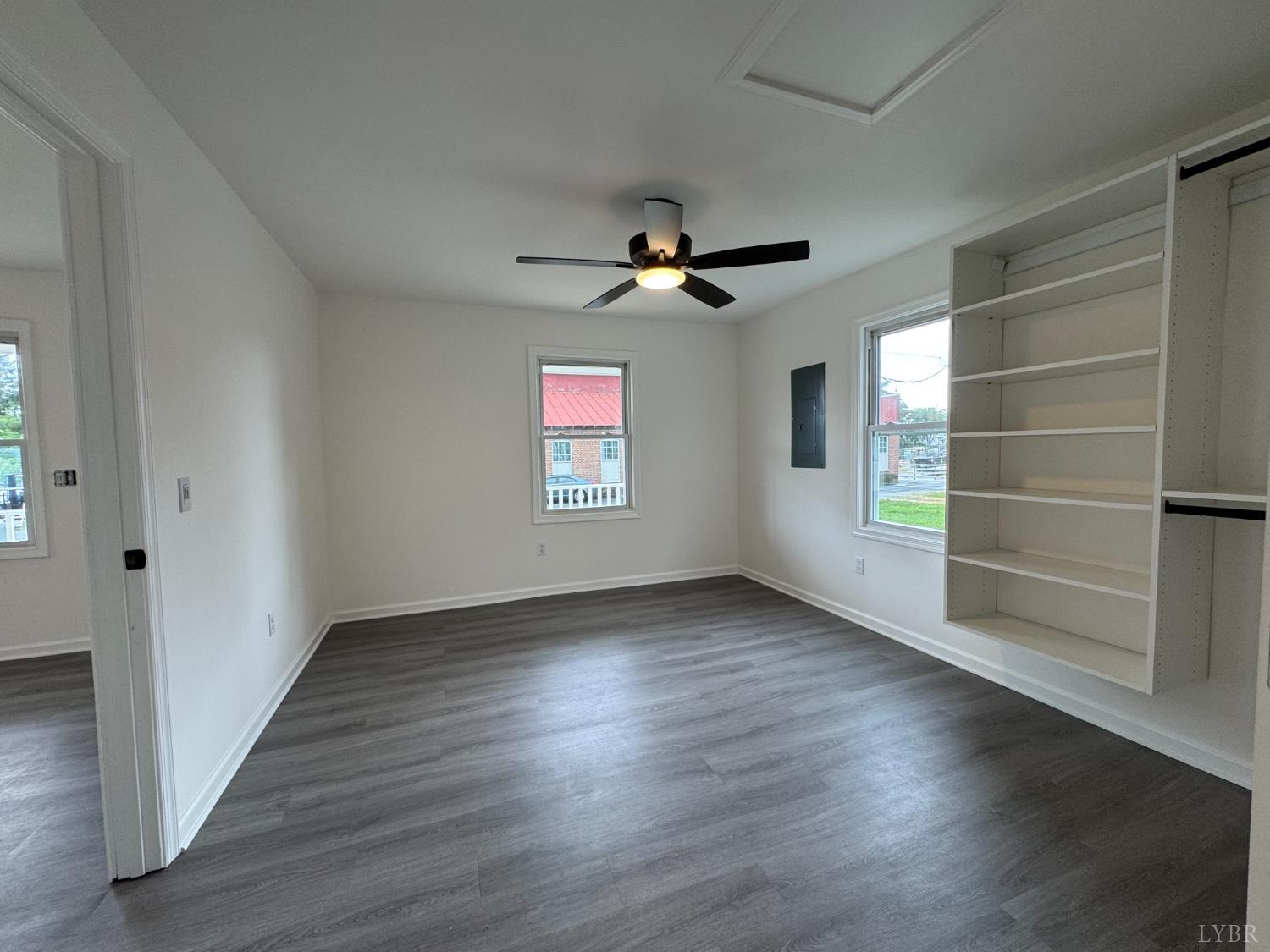 287 Harrell Street Appomattox, VA 24522 - Photo 16 of 17 an empty room with wooden floor and windows
