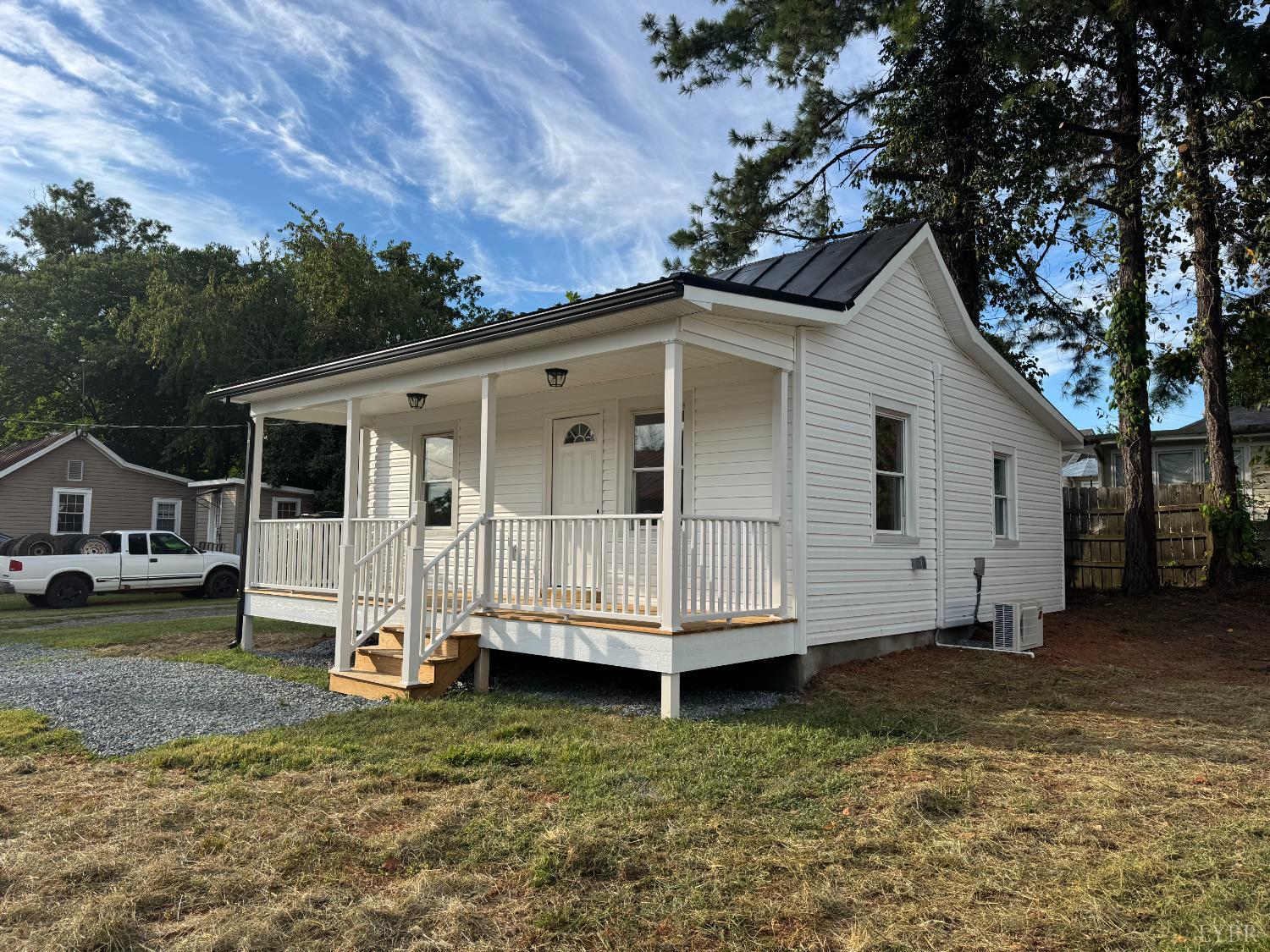 287 Harrell Street Appomattox, VA 24522 - Photo 4 of 17 a view of a house with a yard