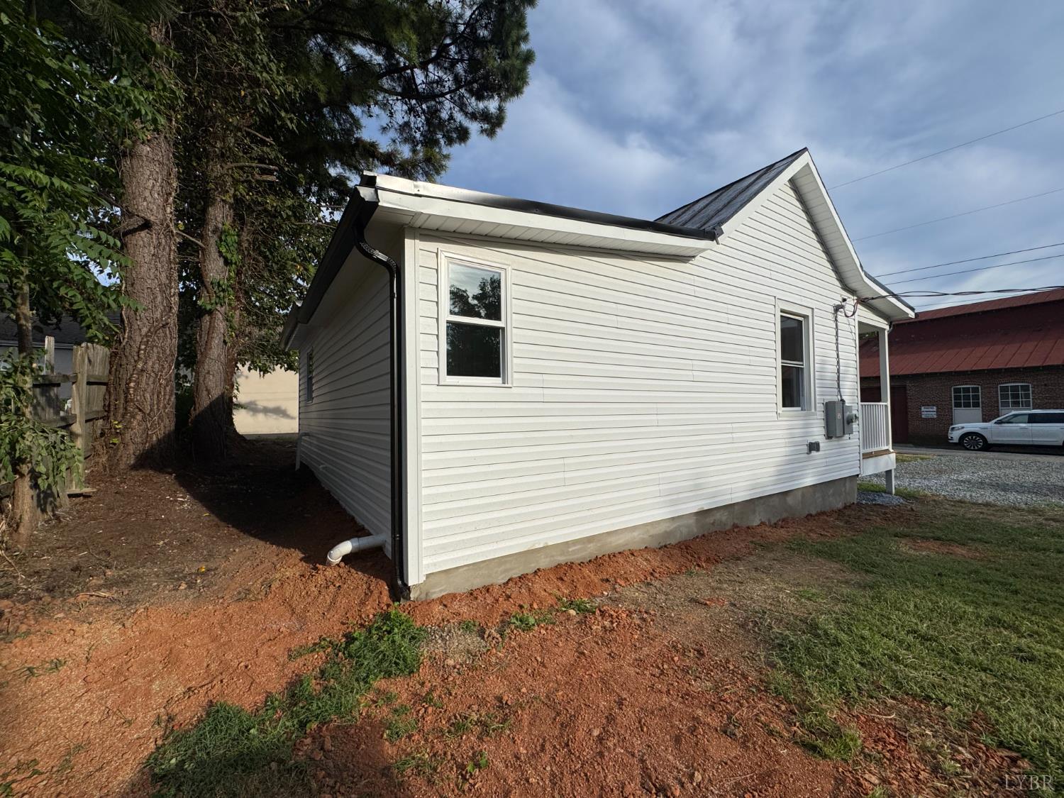 287 Harrell Street Appomattox, VA 24522 - Photo 5 of 17 a view of a house with a yard