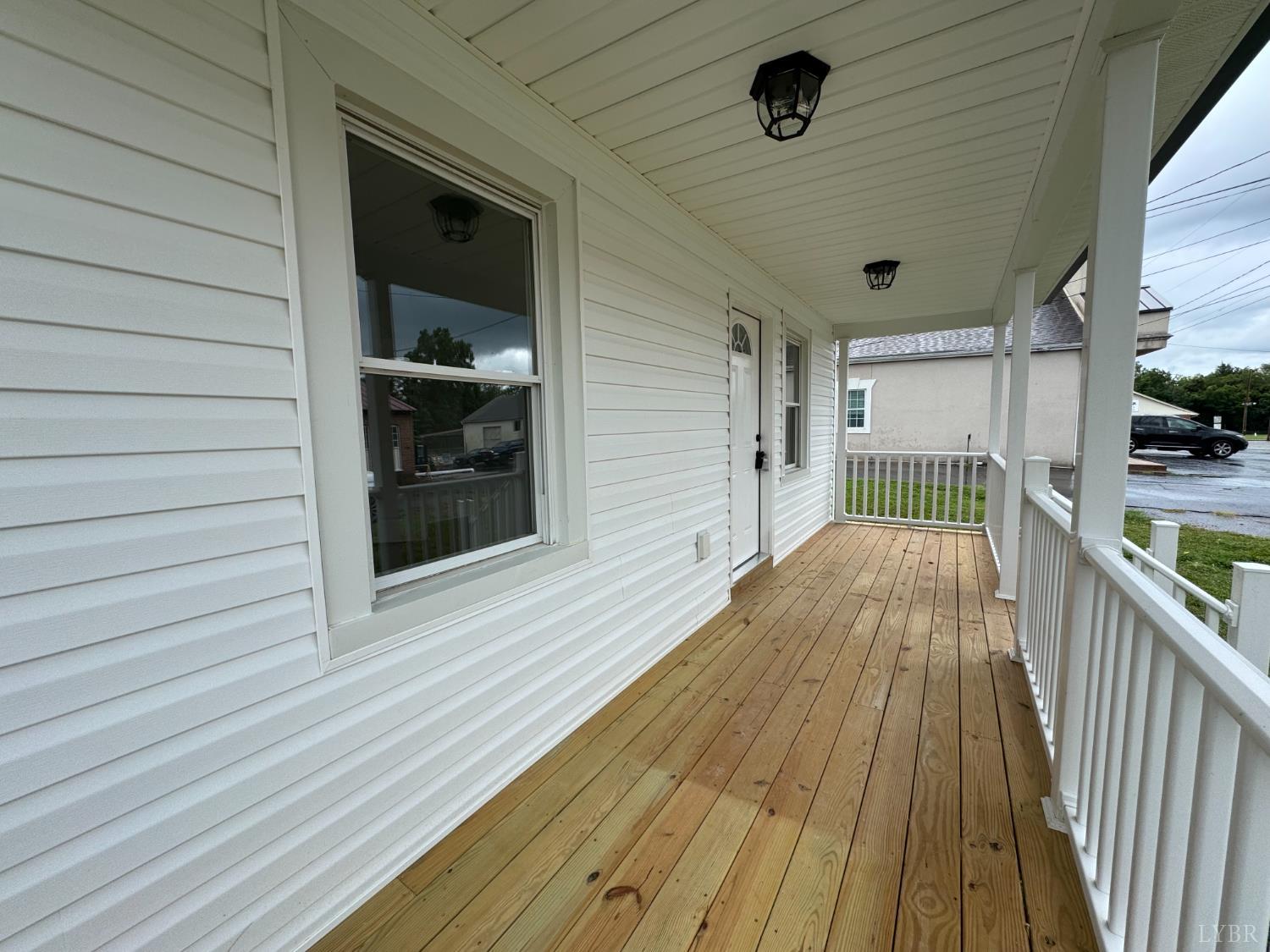 287 Harrell Street Appomattox, VA 24522 - Photo 7 of 17 a view of a balcony with wooden floor