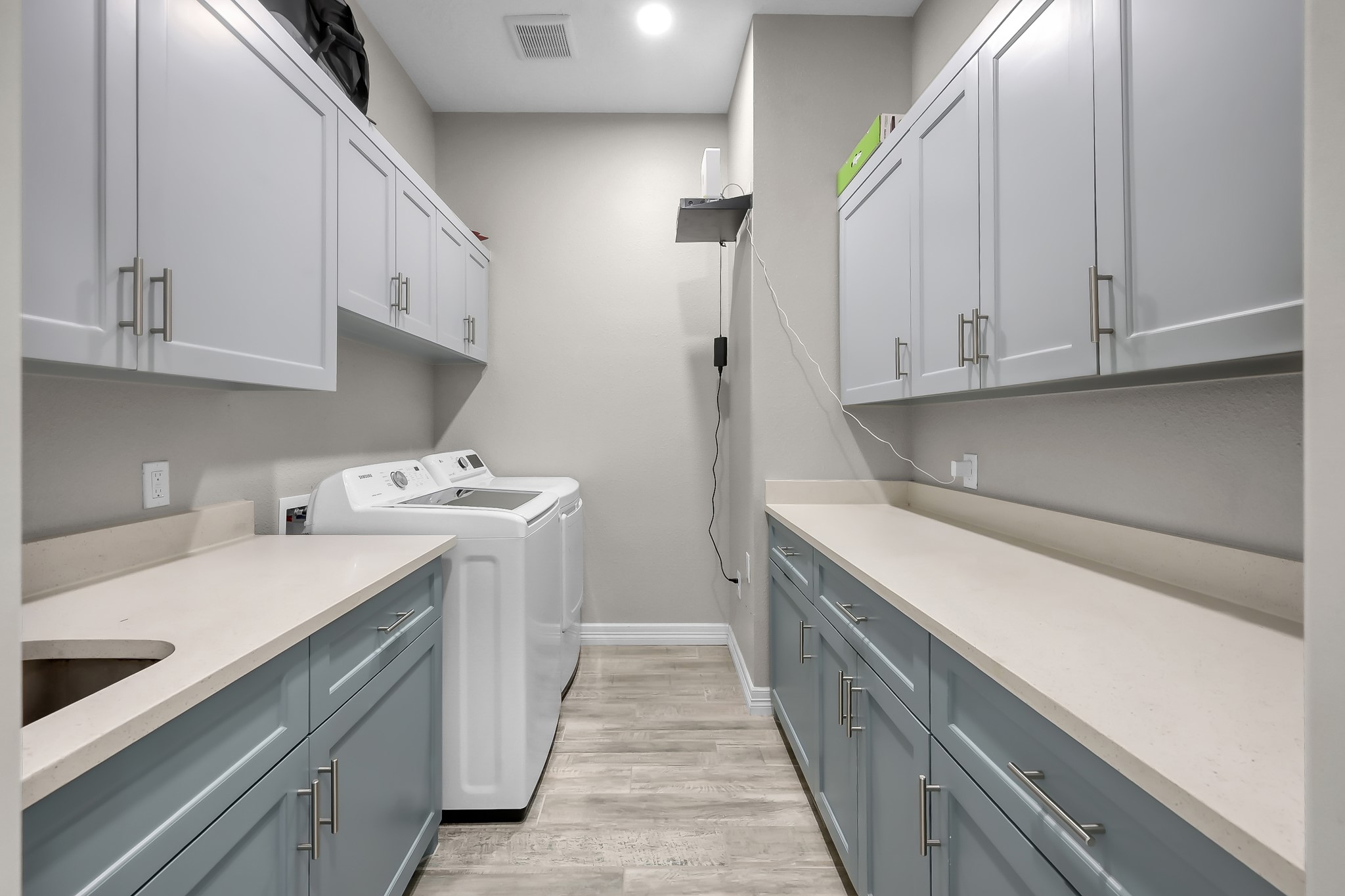 14609 Jim Stowe Road Conroe, TX 77302 - Photo 20 of 24 a utility room with cabinets washer and dryer