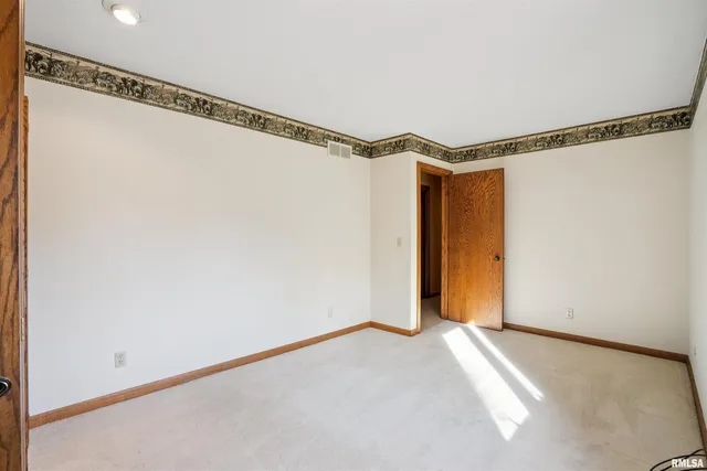 a view of a room with an empty space