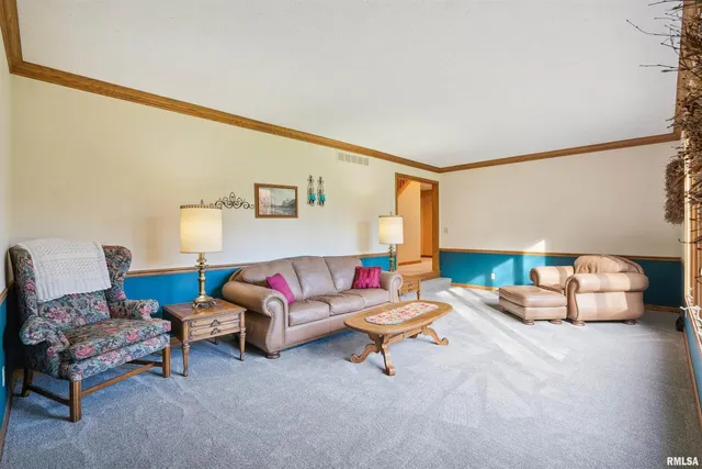 a living room with furniture and a couch