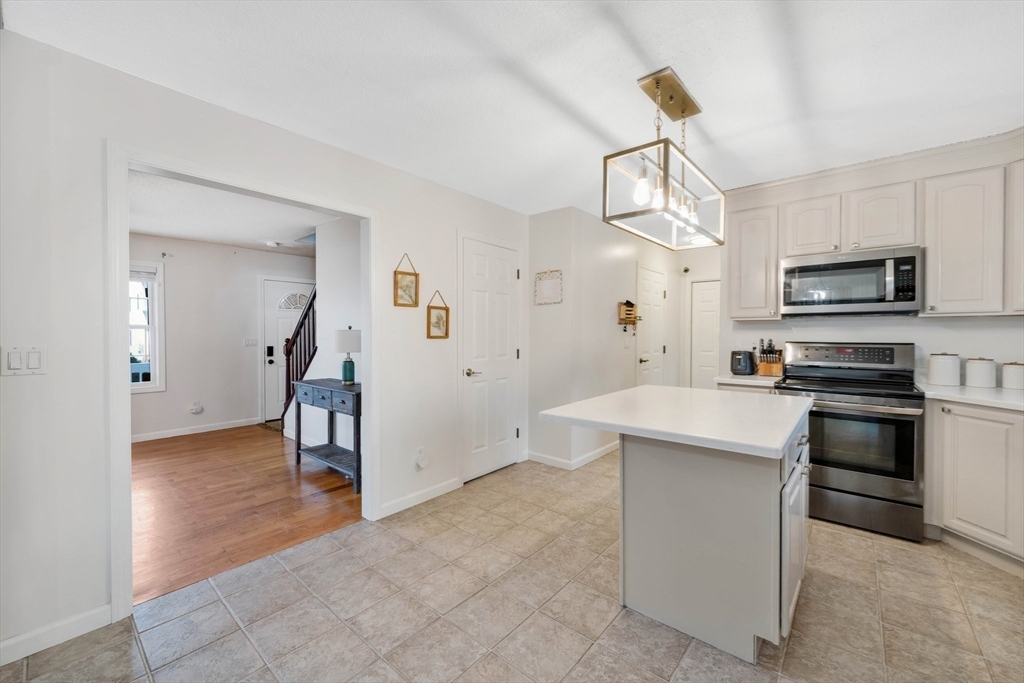 43 Martha Street Springfield, MA 01151 - Photo 8 of 32 a view of a kitchen with electric appliances