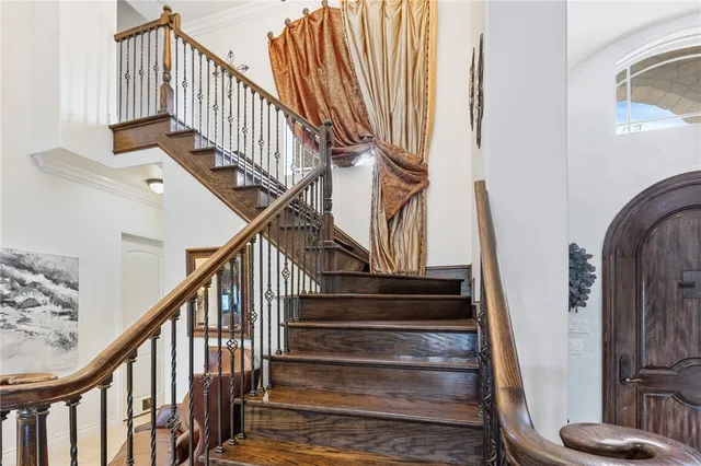 a bed room with a bed and a window