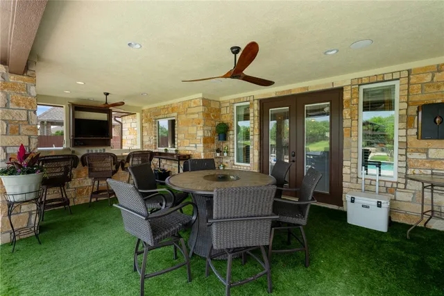 a view of a garden with swimming pool