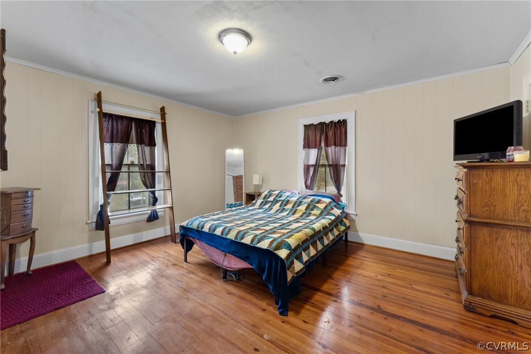 29404 Carson Road Carson, VA 23830 - Photo 31 of 40 a bedroom with a bed and a flat screen tv