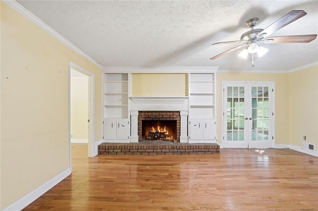 1453 Clearview Drive Northwest Acworth, GA 30102 - Photo 11 of 50 a view of an empty room with window and fire place