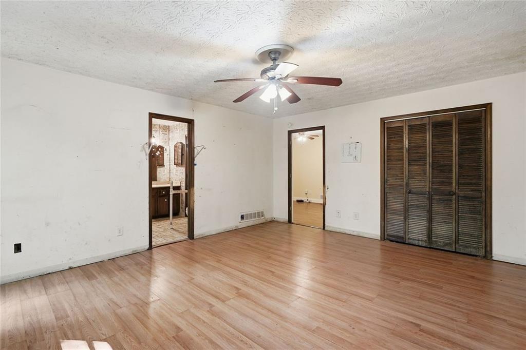 1453 Clearview Drive Northwest Acworth, GA 30102 - Photo 18 of 50 wooden floor in an empty room with a window