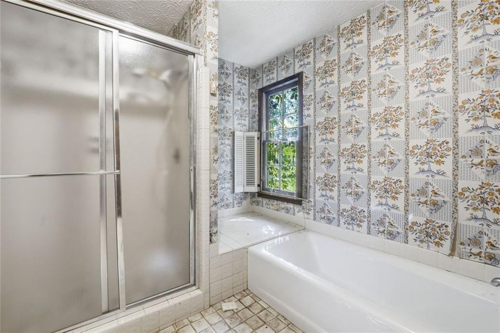 1453 Clearview Drive Northwest Acworth, GA 30102 - Photo 20 of 50 a bathroom with a bathtub and shower