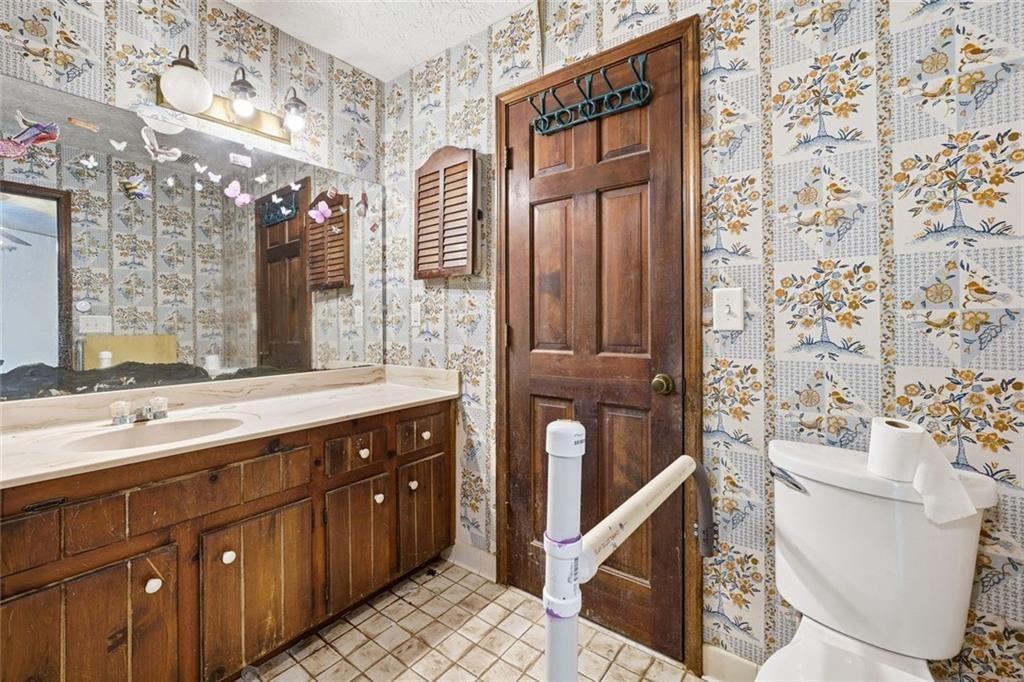 1453 Clearview Drive Northwest Acworth, GA 30102 - Photo 26 of 50 a spacious bathroom with double vanity and a mirror
