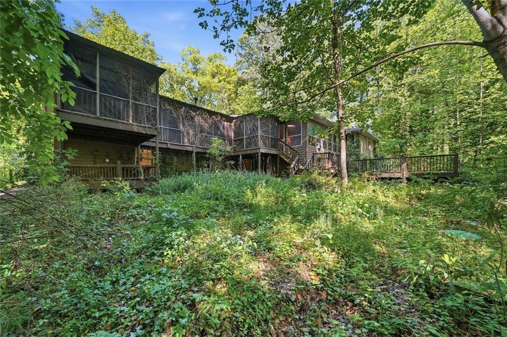 1453 Clearview Drive Northwest Acworth, GA 30102 - Photo 38 of 50 a backyard of a house with lots of green space