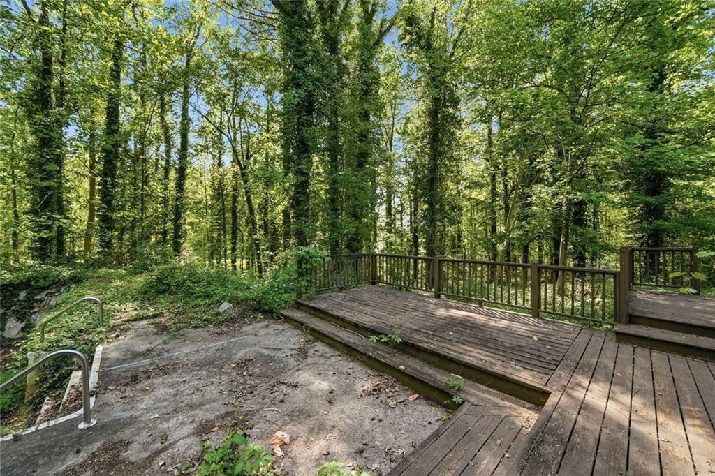 1453 Clearview Drive Northwest Acworth, GA 30102 - Photo 42 of 50 a view of a wooden deck with a yard