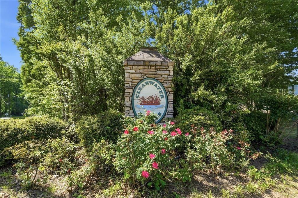 1453 Clearview Drive Northwest Acworth, GA 30102 - Photo 46 of 50 a front view of a house with a yard and fountain