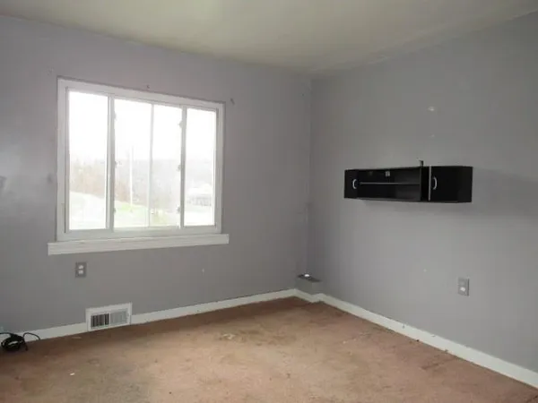 an empty room with a window