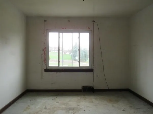 an empty room with a window