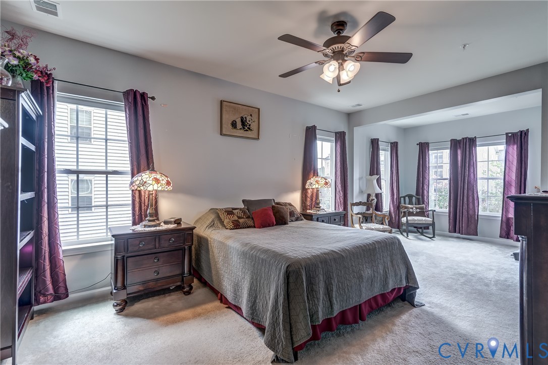 14010 Briars Circle, Unit 204 Midlothian, VA 23114 - Photo 19 of 40 a bedroom with a bed and window