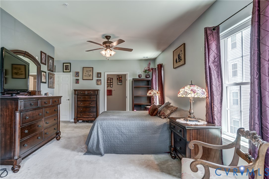 14010 Briars Circle, Unit 204 Midlothian, VA 23114 - Photo 20 of 40 a bedroom with a bed and a television