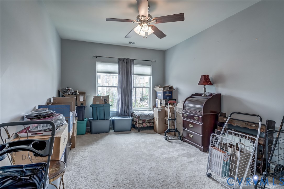 14010 Briars Circle, Unit 204 Midlothian, VA 23114 - Photo 24 of 40 a bedroom with furniture and a window