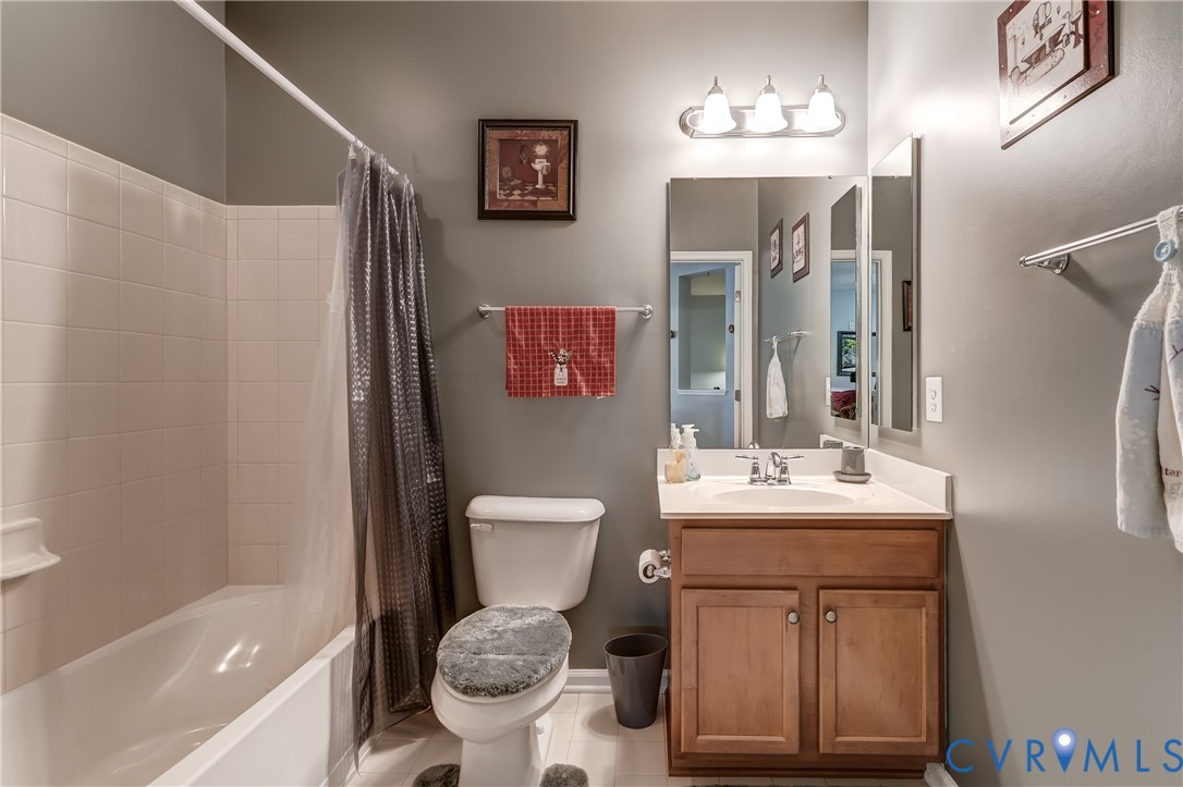 14010 Briars Circle, Unit 204 Midlothian, VA 23114 - Photo 25 of 40 a bathroom with a sink toilet and shower