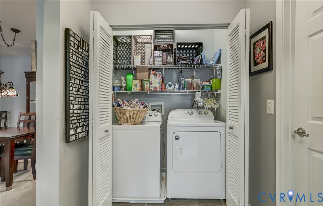 14010 Briars Circle, Unit 204 Midlothian, VA 23114 - Photo 26 of 40 a utility room with dryer and washer