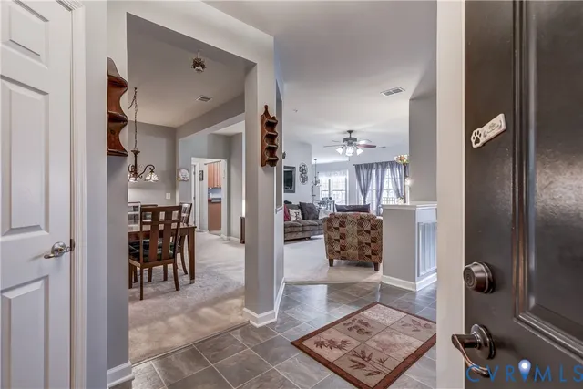 a view of a living room and dining room