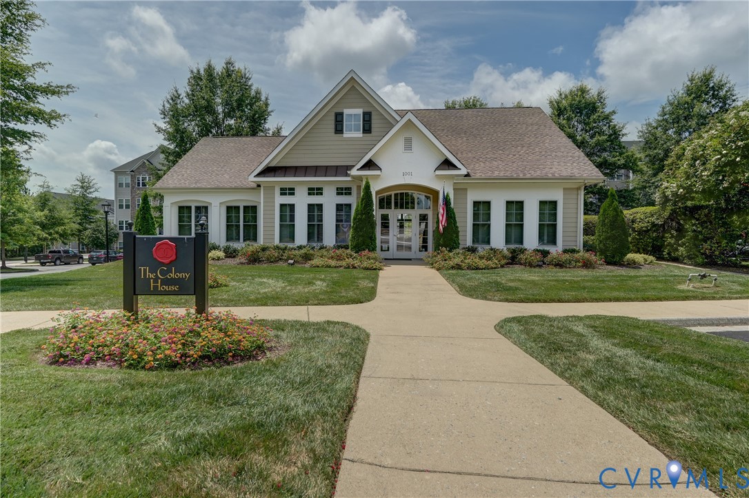 14010 Briars Circle, Unit 204 Midlothian, VA 23114 - Photo 33 of 40 a front view of a house with a yard