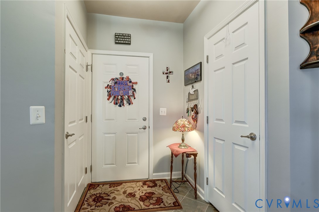 14010 Briars Circle, Unit 204 Midlothian, VA 23114 - Photo 4 of 40 a bathroom with a sink and a mirror
