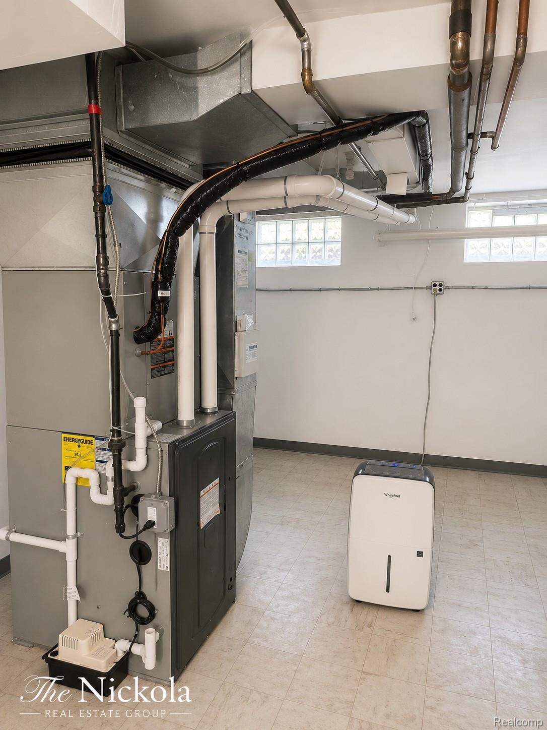 515 Barrington Road Detroit, MI 48215 - Photo 25 of 27 Utility room featuring heating unit
