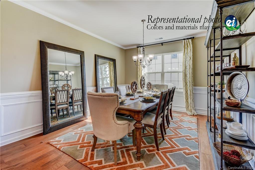 5116 Tranquility Boulevard, Unit 678 Lancaster, SC 29720 - Photo 11 of 21 a view of a dining room with furniture and a window