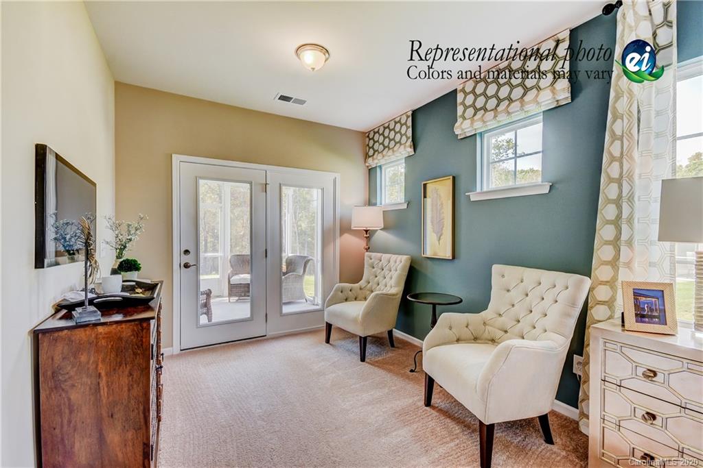 5116 Tranquility Boulevard, Unit 678 Lancaster, SC 29720 - Photo 20 of 21 a living room with furniture and a window