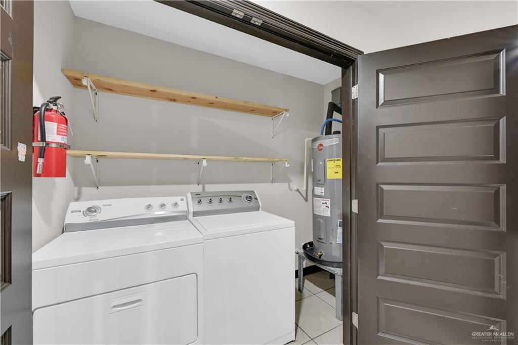 606 North Inspiration Road, Unit 6 Alton, TX 78573 - Photo 12 of 14 a utility room with dryer and washer