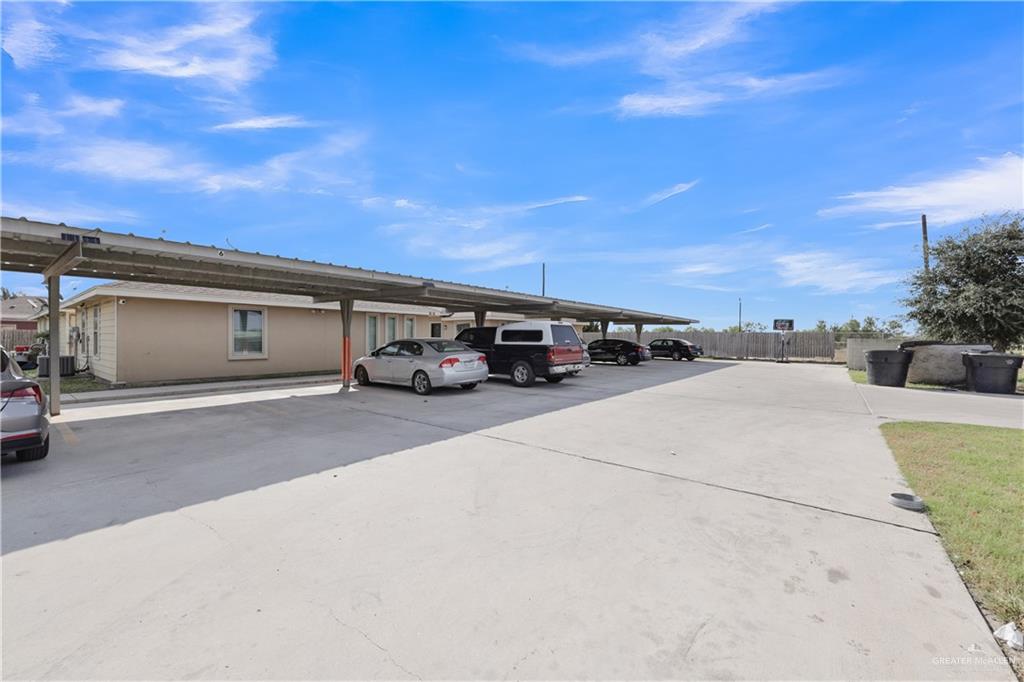 606 North Inspiration Road, Unit 6 Alton, TX 78573 - Photo 13 of 14 a car parked on the side of the road