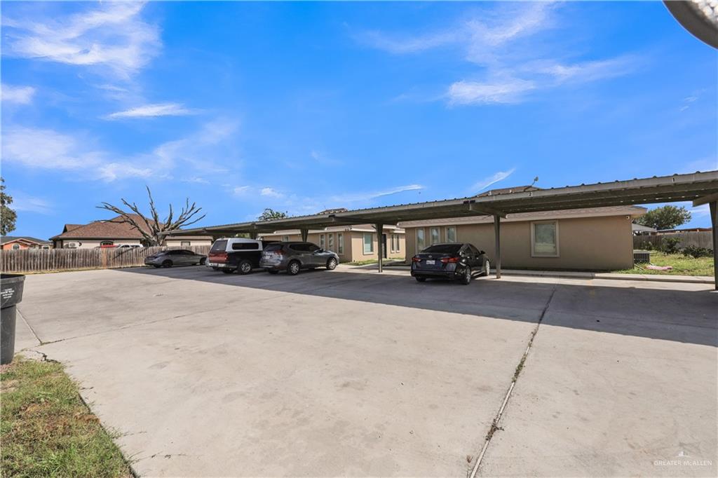 606 North Inspiration Road, Unit 6 Alton, TX 78573 - Photo 14 of 14 a car parked in front of a house