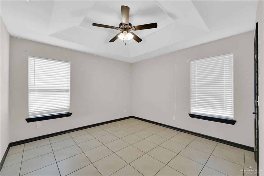 606 North Inspiration Road, Unit 6 Alton, TX 78573 - Photo 10 of 14 a view of an empty room with a window