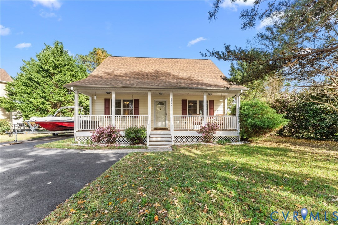 1120 South Glebe Road Montross, VA 22520 - Photo 2 of 31 a view of a house with a patio