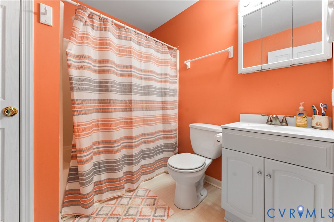 1120 South Glebe Road Montross, VA 22520 - Photo 23 of 31 a bathroom with a sink toilet and shower