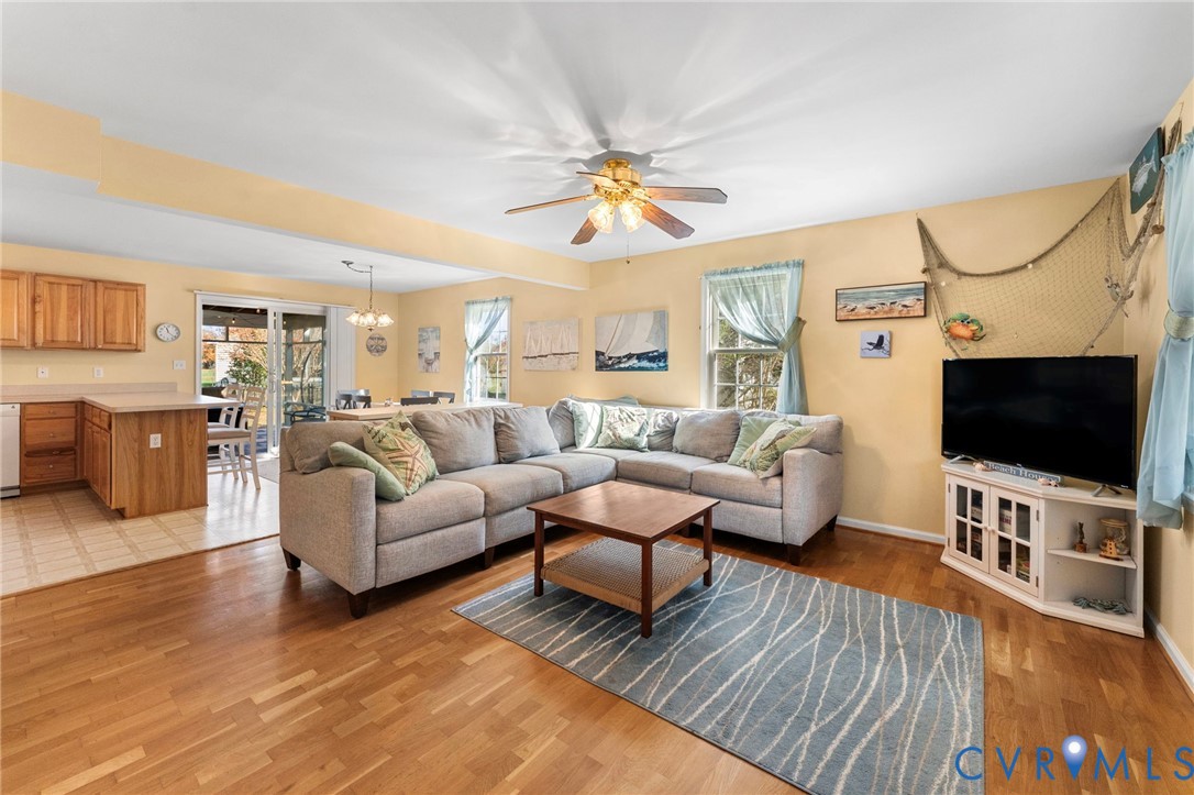1120 South Glebe Road Montross, VA 22520 - Photo 6 of 29 a living room with furniture and a flat screen tv