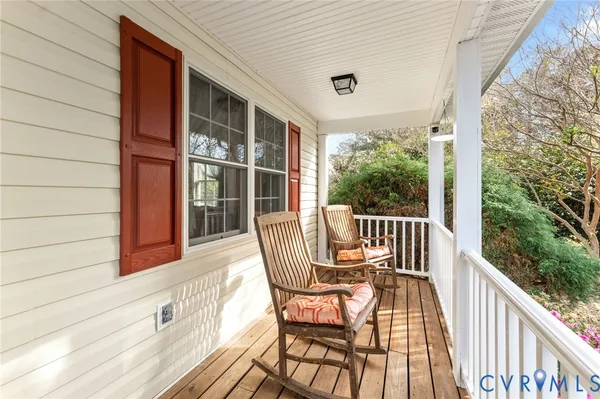 a view of balcony with furniture