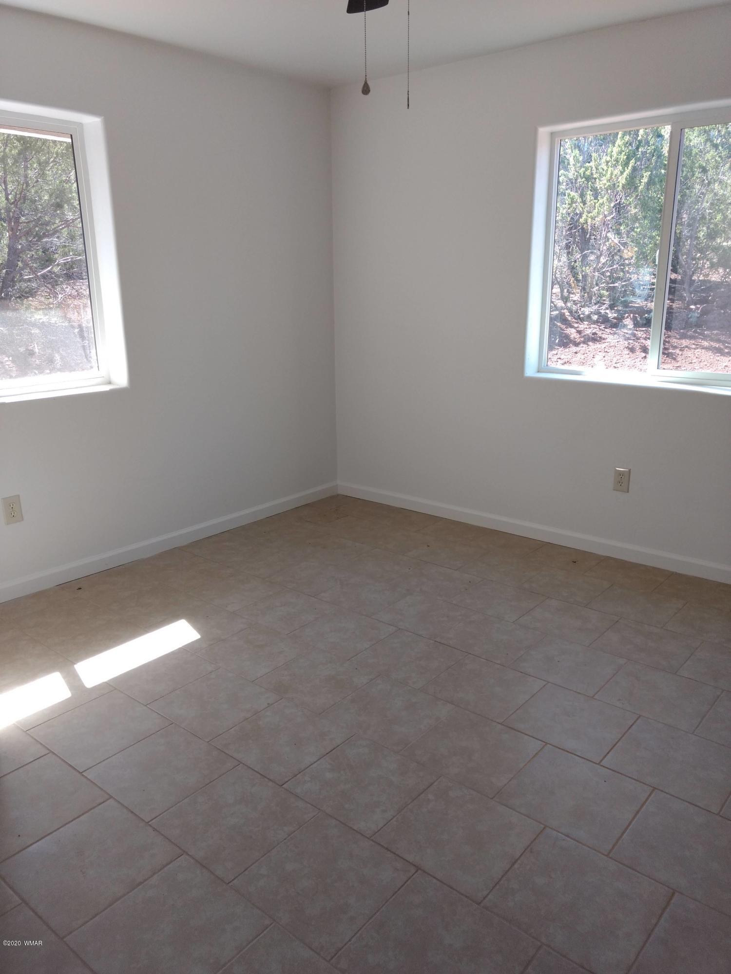 9 County Road Show Low, AZ 85901 - Photo 17 of 46 an empty room with a window