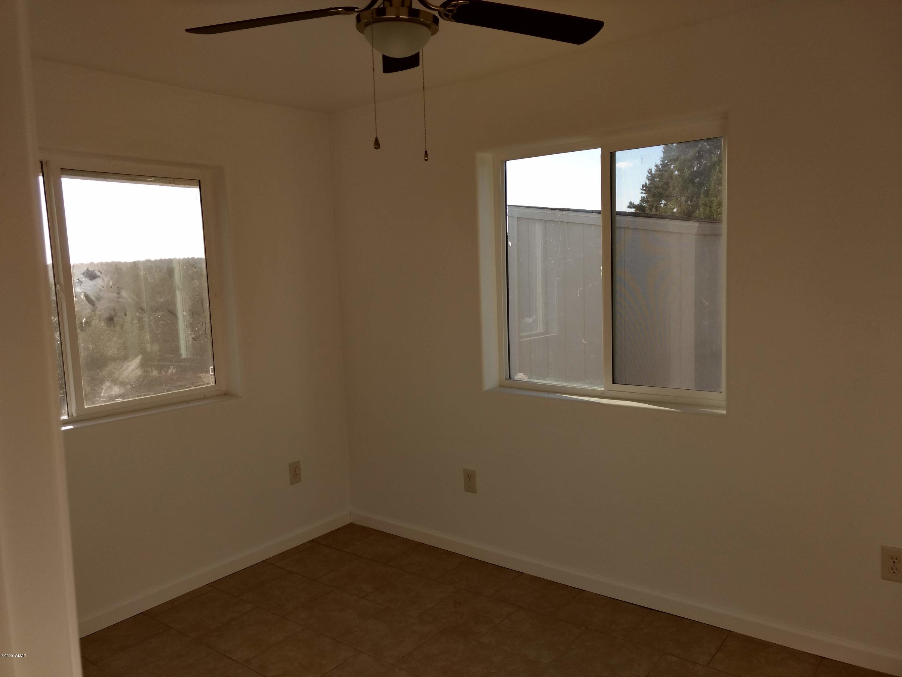 9 County Road Show Low, AZ 85901 - Photo 21 of 46 an empty room with windows
