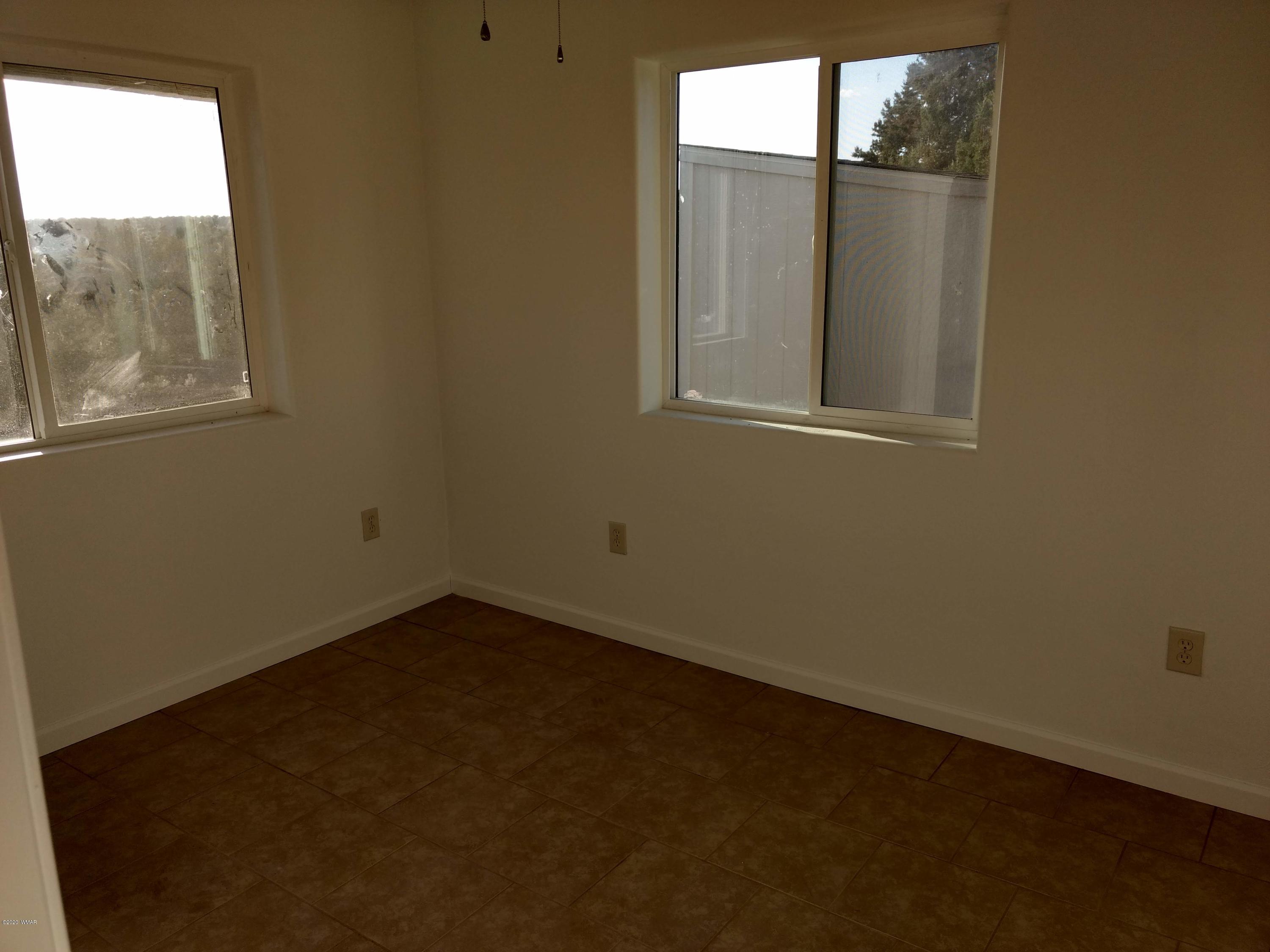 9 County Road Show Low, AZ 85901 - Photo 24 of 46 a view of an empty room with a window