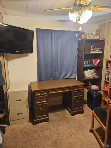 a room with furniture and chandelier