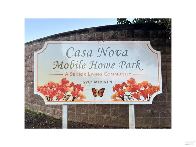 a sign on the wall of the building